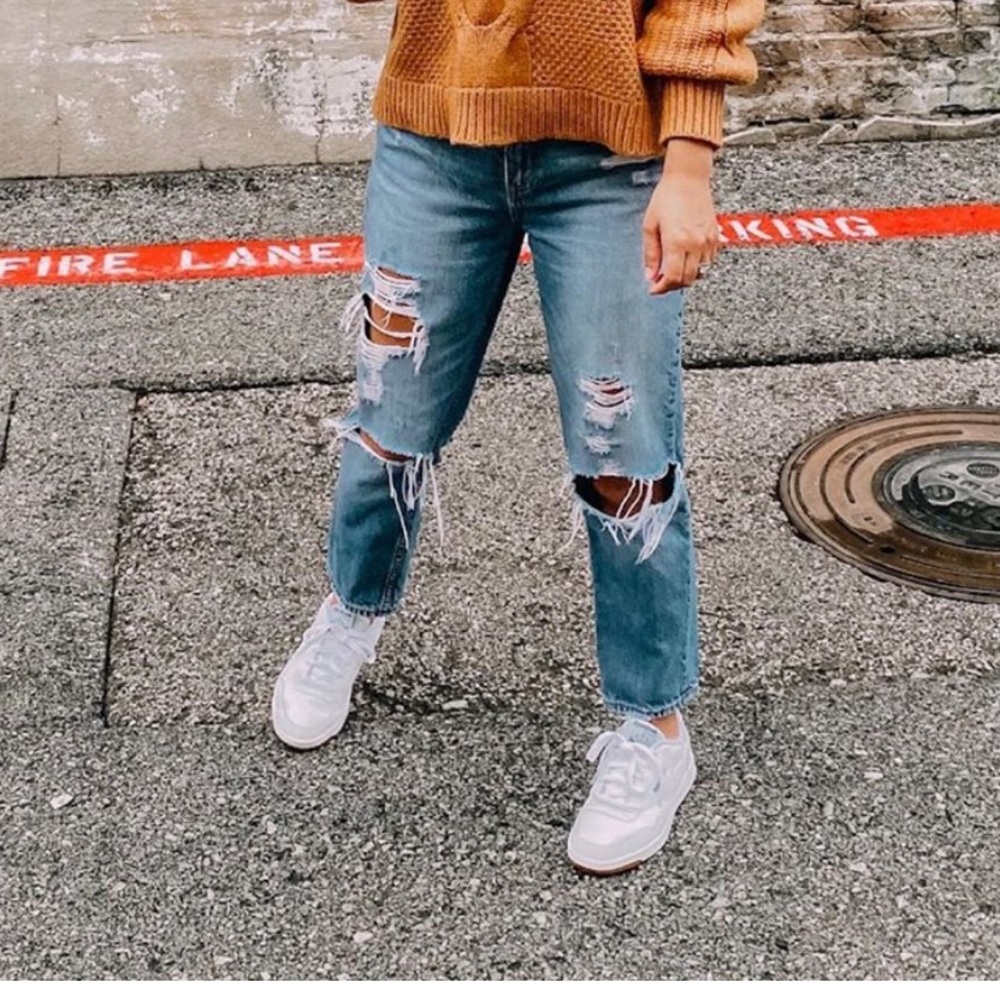 Distressed dark wash denim